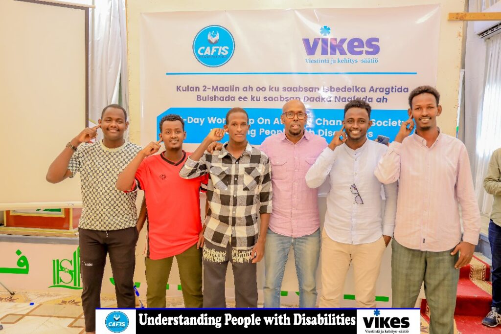 Vammaisten päivän seminaarin osallistujia